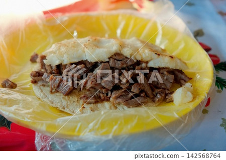 Torta filled with minced beef from Mexico City 142568764