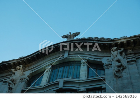 Decorative facades of historic buildings in Mexico City against the backdrop of the blue sky in the historic district. Decorative facades of historic buildings in Mexico City against the backdrop of the blue sky in the historic district. 142569016