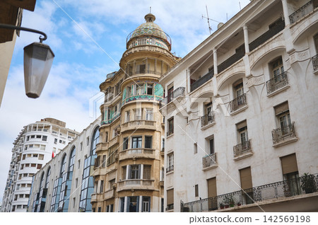 Art Deco architecture and historic white buildings in Casablanca, Morocco street view Art Deco architecture and historic white buildings in Casablanca, Morocco street view 142569198