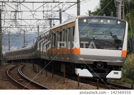 E233 series train on the Chuo Rapid Line running between Toyoda and Hachioji. E233 series train on the Chuo Rapid Line running between Toyoda and Hachioji. 142569350