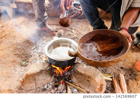 Brewing coffee on the bonfire Brewing coffee on the bonfire 142569607