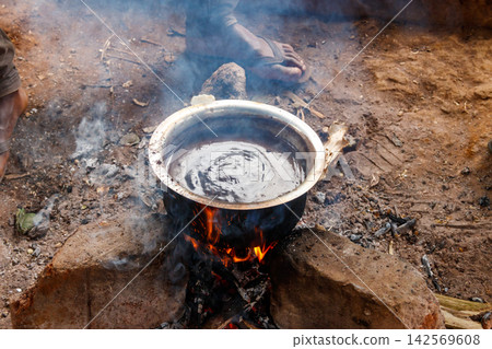 Brewing coffee on the bonfire Brewing coffee on the bonfire 142569608