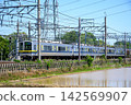 A Tobu 20400 series train waiting to depart on a siding. 142569907