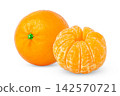 Ripe tangerine or clementine fruit with peeled one. Fresh mandarin fruit with slices of clementine on white background. 142570721