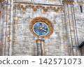 Stone Facade with Clock Face on St. Stephen's Dome, Vienna 142571073