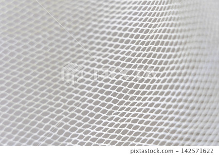 Net pattern close up. Rope net . Soccer, football, volleyball, tennis and tennis net pattern. Fisherman hunting net rope texture Net pattern close up. Rope net . Soccer, football, volleyball, tennis and tennis net pattern. Fisherman hunting net rope texture 142571622
