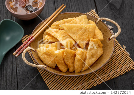 traditional Chinese Breakfast Fried Dough Blanket Youbing, Golden Crispy Flatbread Cruller 142572034