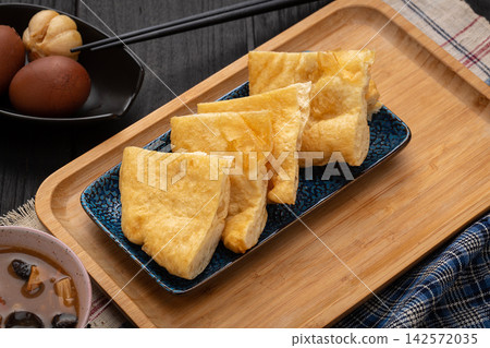 traditional Chinese Breakfast Fried Dough Blanket Youbing, Golden Crispy Flatbread Cruller traditional Chinese Breakfast Fried Dough Blanket Youbing, Golden Crispy Flatbread Cruller 142572035