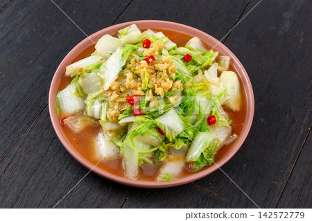 stir-fried quick cabbage with minced garlic sauce authentic chinese greens stir-fried quick cabbage with minced garlic sauce authentic chinese greens 142572779