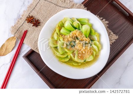 stir-fried bok choy with oyster sauce and minced garlic chinese cuisine stir-fried bok choy with oyster sauce and minced garlic chinese cuisine 142572781