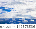 large cloud closes sun in dark blue storm sky 142573536