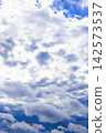 dark gray rainy clouds cover sun in dark blue sky 142573537