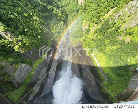 Dam and rainbow Dam and rainbow 142574358