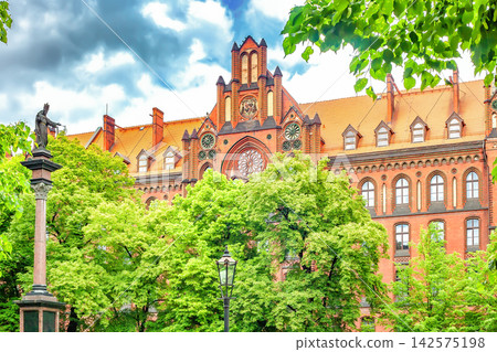 Red brick historic building Metropolitalne Wyzsze Seminarium Duchowne in neo-Gothic style in Wroclaw, Poland. 142575198