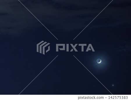 Stars glowing on dark blue night sky. Night clear cloudscape with crescent moon and star 142575383