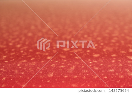 A close-up of a red car body, dirty with yellow dust and pollen after the rain. The focus is on the background. A close-up of a red car body, dirty with yellow dust and pollen after the rain. The focus is on the background. 142575654