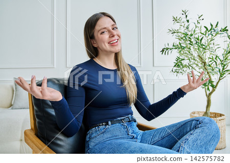 Web cam view of young woman talking looking in camera, online meeting, video call Web cam view of young woman talking looking in camera, online meeting, video call 142575782