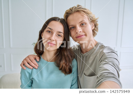 Two happy teenage friends taking a selfie portrait Two happy teenage friends taking a selfie portrait 142575949