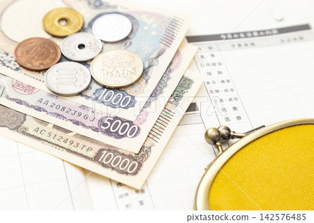 Household account book, money, and wallet Household account book, money, and wallet 142576485