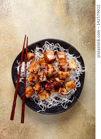 fried eggplant, with funchosa noodles, with teriyaki sauce and sesame seeds, homemade, no people fried eggplant, with funchosa noodles, with teriyaki sauce and sesame seeds, homemade, no people 142579012