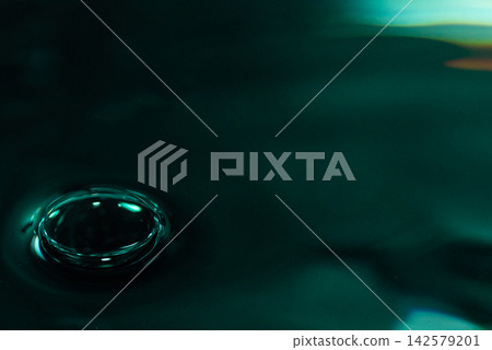 337.Single Bubble on Dark Teal Reflective Liquid Surface 337.Single Bubble on Dark Teal Reflective Liquid Surface 142579201