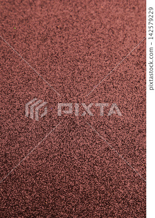 Textured background space for creative projects with a gentle brushed appearance in warm tones for use in design and layout Textured background space for creative projects with a gentle brushed appearance in warm tones for use in design and layout 142579229