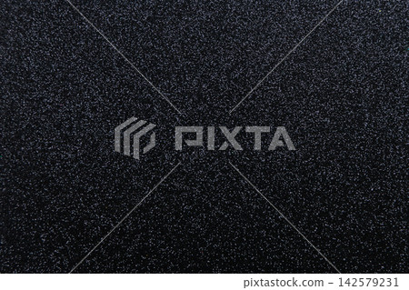 Textured black background for adding text or designs in various projects and applications Textured black background for adding text or designs in various projects and applications 142579231