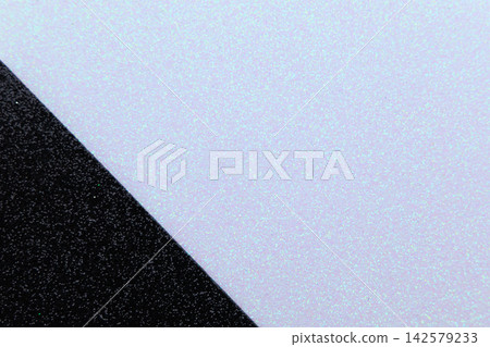 Texture background space available for text or design on a surface with black and white patterns Texture background space available for text or design on a surface with black and white patterns 142579233