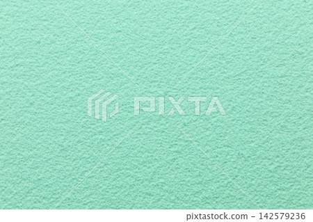 Textured green background space suitable for adding text and graphics in various designs and layouts for different projects Textured green background space suitable for adding text and graphics in various designs and layouts for different projects 142579236