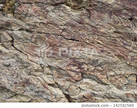 serene rock formation in natural outdoor environment with wide-angle perspective and brown and gray igneous rock material, geological studies and educational resources. serene rock formation in natural outdoor environment with wide-angle perspective and brown and gray igneous rock material, geological studies and educational resources. 142582560