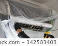 Air conditioner cleaning 142583403