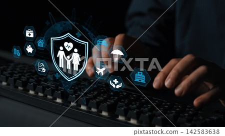 Hands Typing on Keyboard with Health and Family Icons Representing Insurance and Digital Protection Concepts in a Modern Setting. Entropy 142583638
