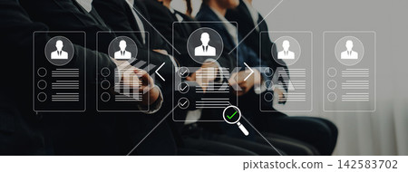 Professional Job Interview Process with Resumes and Candidates in Business Attire Discussing Employment Opportunities with Visual Checkmarks. Glyphic Professional Job Interview Process with Resumes and Candidates in Business Attire Discussing Employment Opportunities with Visual Checkmarks. Glyphic 142583702