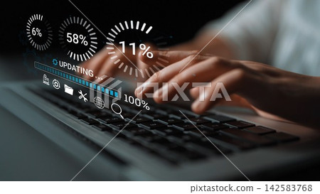 Hands Typing on Keyboard while Digital Progress Indicators Display Percentage Updates and Loading Status on a Dark Background. Entropy 142583768