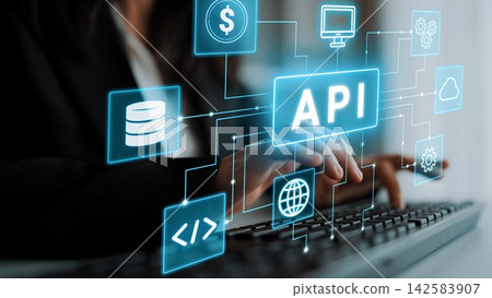 Businessperson Working on API Integration with Data Analysis, Cloud Computing, and Technology Icons in a Modern Office Environment. Entropy 142583907