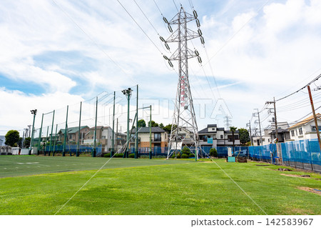 A clear summer sky overlooking the vast grounds of Kajima Construction's Shibasaki Ground, Kikunodai, Chofu City, Tokyo. A clear summer sky overlooking the vast grounds of Kajima Construction's Shibasaki Ground, Kikunodai, Chofu City, Tokyo. 142583967