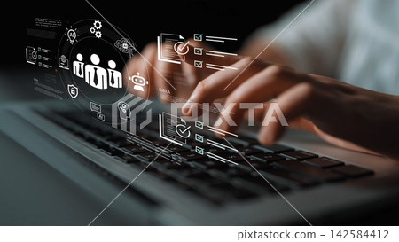 Business person typing on laptop with digital icons and technology graphics representing data analysis, collaboration, and innovation in modern workplace Gluon Business person typing on laptop with digital icons and technology graphics representing data analysis, collaboration, and innovation in modern workplace Gluon 142584412