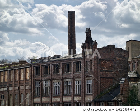 Detailed view of weathered bricks. Urban architectural features captured with textured weathered bricks Detailed view of weathered bricks. Urban architectural features captured with textured weathered bricks 142584472
