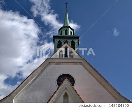 Typical sacred structure topped with verdant growth extends vividly into bright morning environment Typical sacred structure topped with verdant growth extends vividly into bright morning environment 142584500