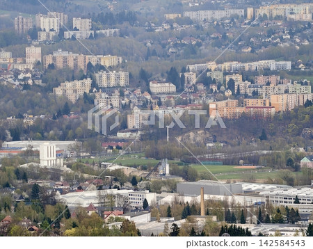 Suburban growth with infrastructure. Expansion of suburban areas featuring housing and open spaces Suburban growth with infrastructure. Expansion of suburban areas featuring housing and open spaces 142584543