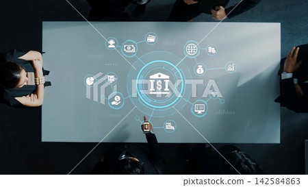 Modern Business Meeting with Digital Interface Representing Financial Technology and Data Analytics in a Corporate Setting. Entropy 142584863