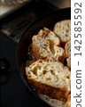 French toast, French toasts, being cooked 142585592