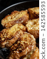 French toast, French toasts, being cooked 142585593