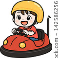 A boy riding a bumper car 142586256