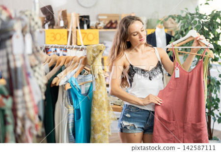 Young woman on summer sale Young woman on summer sale 142587111