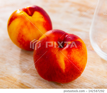 Fresh nectarine fruit served on table Fresh nectarine fruit served on table 142587292