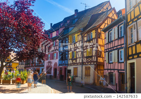 Embankment of Lauch River with historical houses in Colmar, France Embankment of Lauch River with historical houses in Colmar, France 142587633