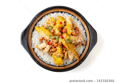 Chinese claypot rice with tender steamed chicken, peanuts and chili pepper, top view Chinese claypot rice with tender steamed chicken, peanuts and chili pepper, top view 142588368