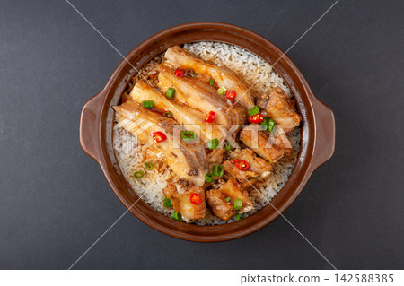 Chinese combo claypot rice with tender fish belly and savory pork ribs, Cantonese baozaifan 142588385