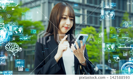Women using smartphones in the city and digital technology Women using smartphones in the city and digital technology 142588593